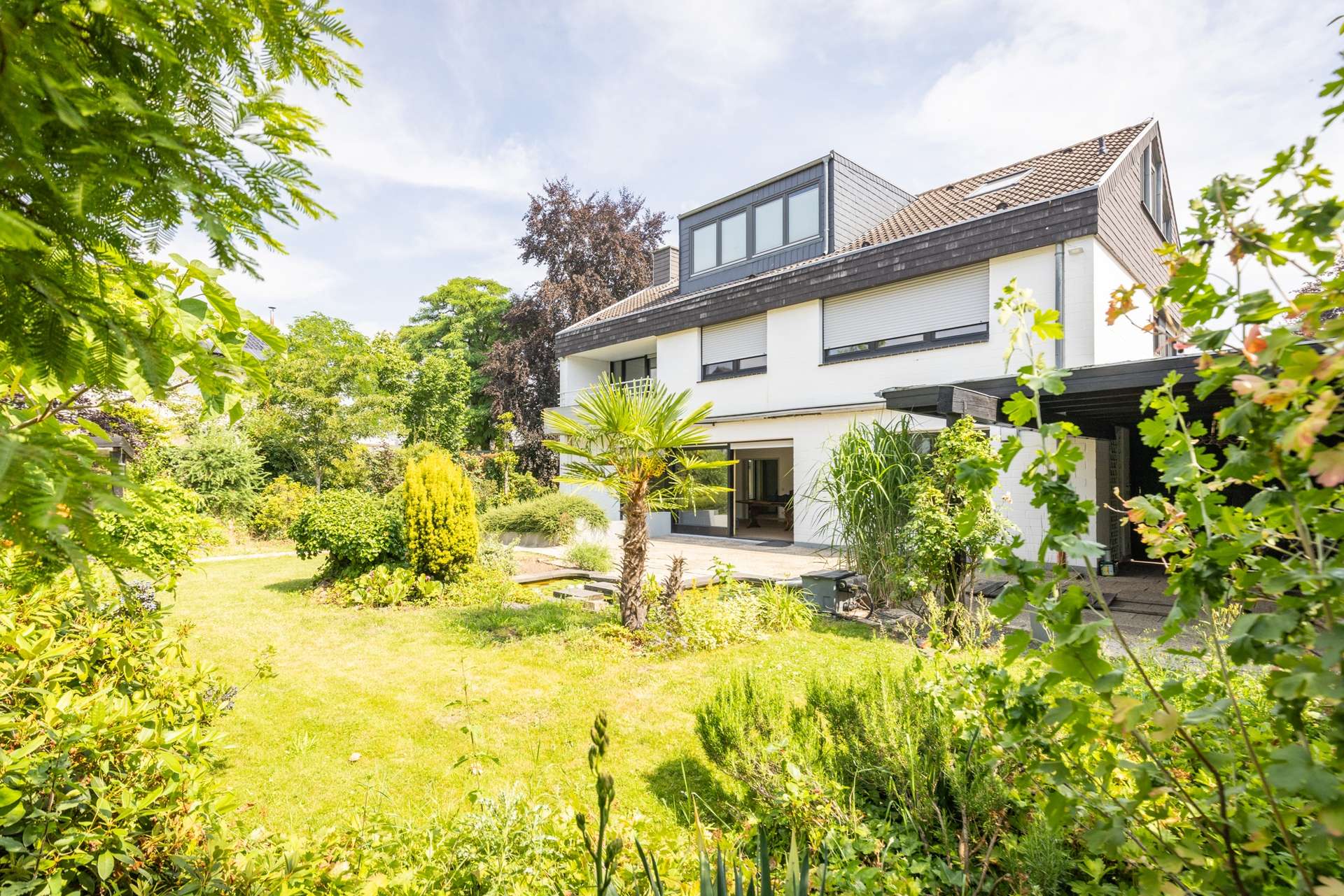 Gartenfreunde aufgepasst! Erdgeschosswohnung mit Garten, Teich und Wintergarten in Alfter